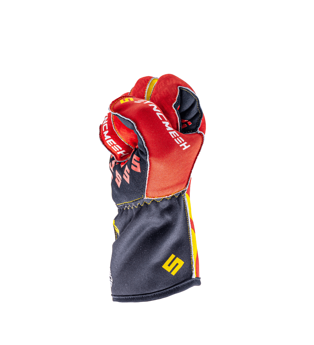 Syncmesh Grip M2X Blaze sim racing glove in red, side view with fingers curled around a wheel rim