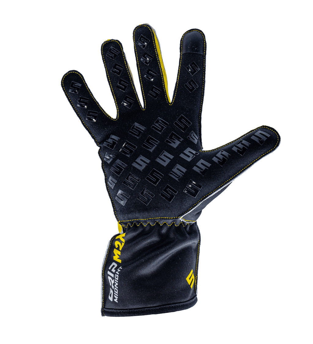 Syncmesh Grip M2X Midnight sim racing glove, palm view showing the yellow S-logo silicone grip pattern