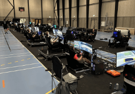 Sim racing community event with multiple racers